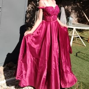 Maroon Prom dress with corset style top and a silk bottom